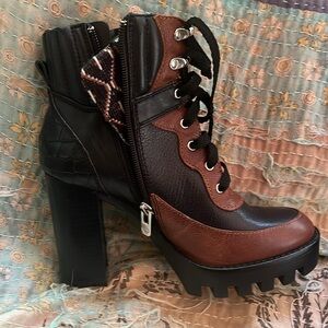 Antonio Melani lace up booties in black/ brown leather